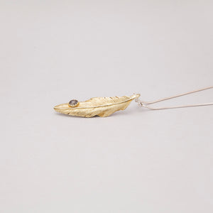YELLOW BRASS FEATHER PENDANT WITH LABRADORITE DROP