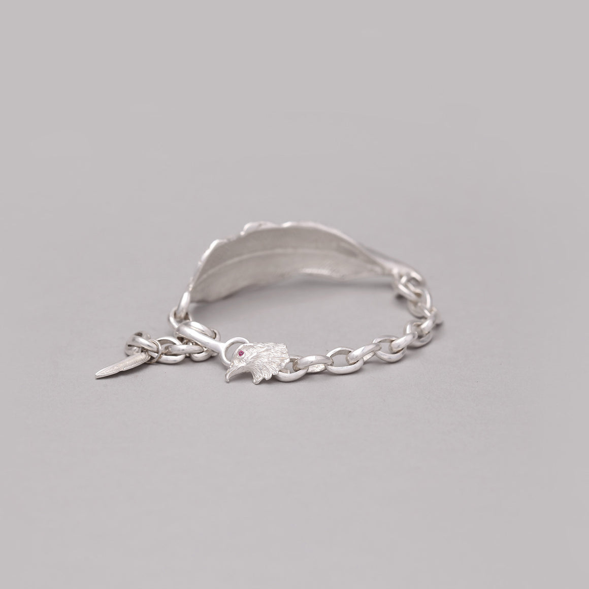 SILVER PLATED FEATHER CHAIN LINK BRACELET WITH LAPIS ACCENT
