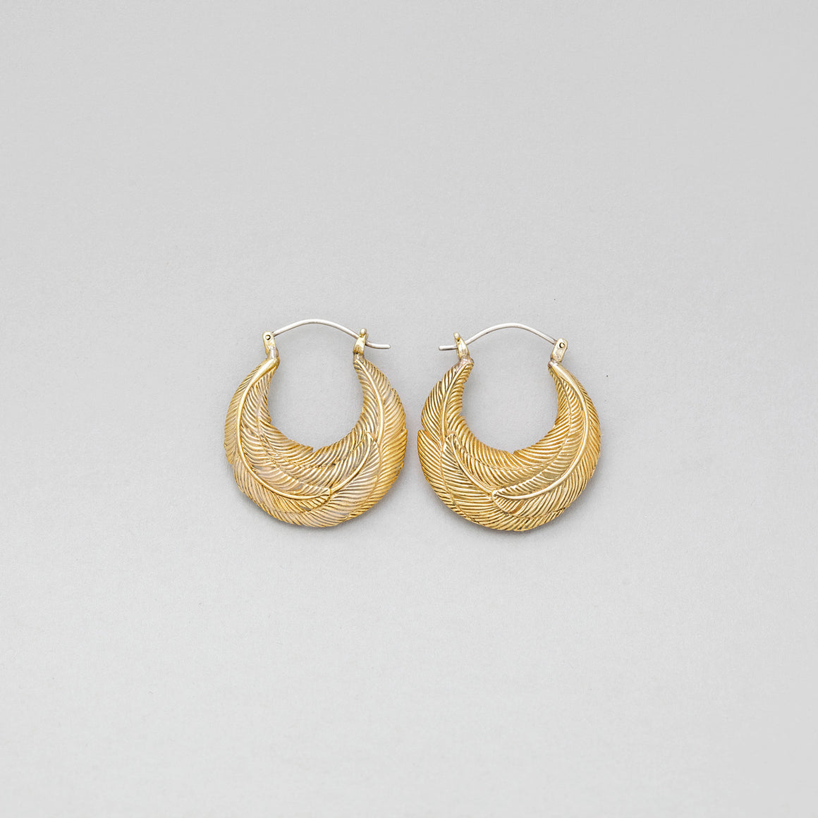 YELLOW BRASS ROUNDED FEATHER HOOP EARRINGS