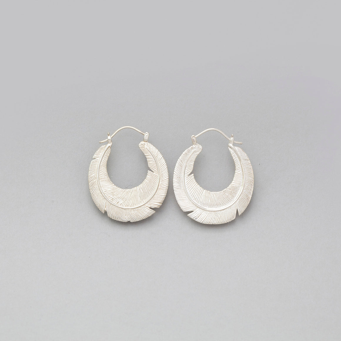 STERLING SILVER ROUNDED FEATHER HOOP EARRINGS