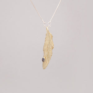 YELLOW BRASS FEATHER PENDANT WITH LABRADORITE DROP