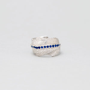 WHITE BRASS FEATHER RING WITH SRI LANKAN SAPPHIRE